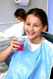 child on dental chair