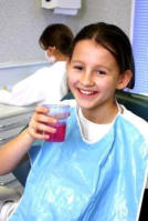 child on dental chair